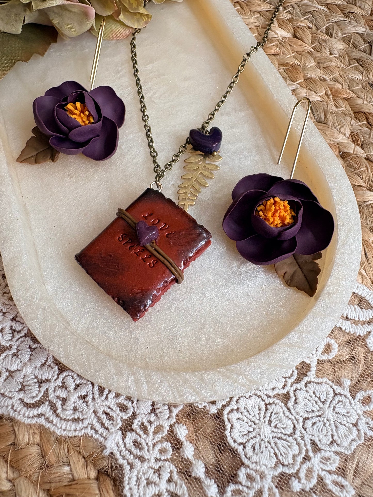 Miniature “Love Spells” hand crafted book necklace