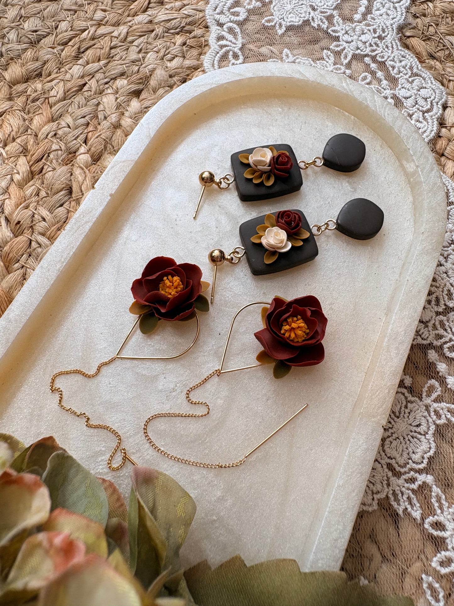Moody green floral dangles