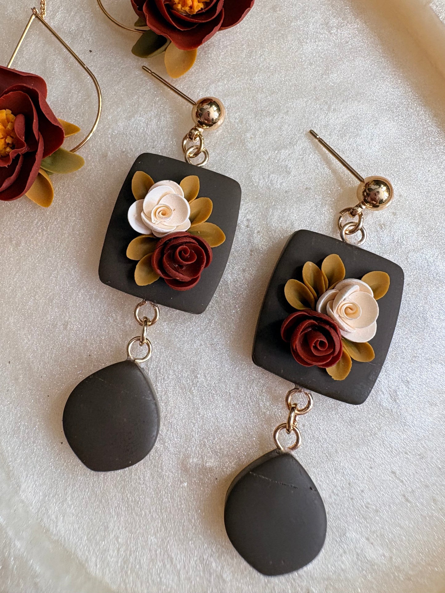 Moody green floral dangles