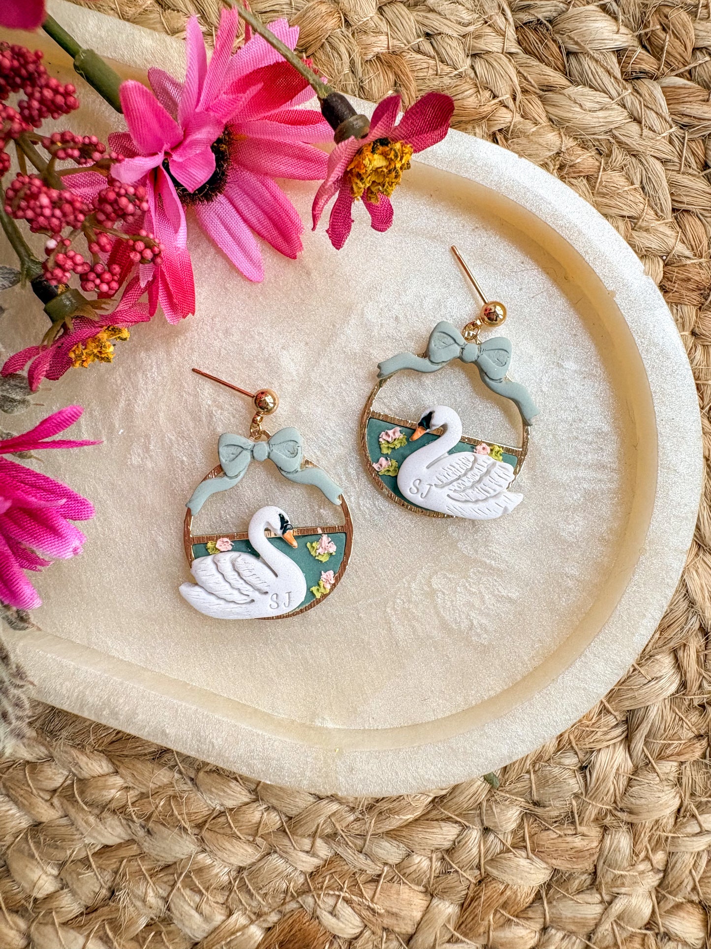 Elegant swan and bow earrings