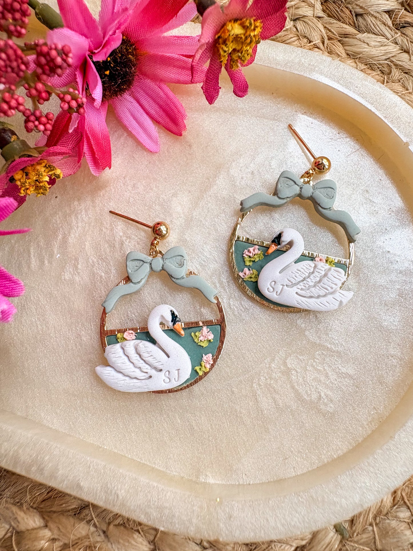 Elegant swan and bow earrings