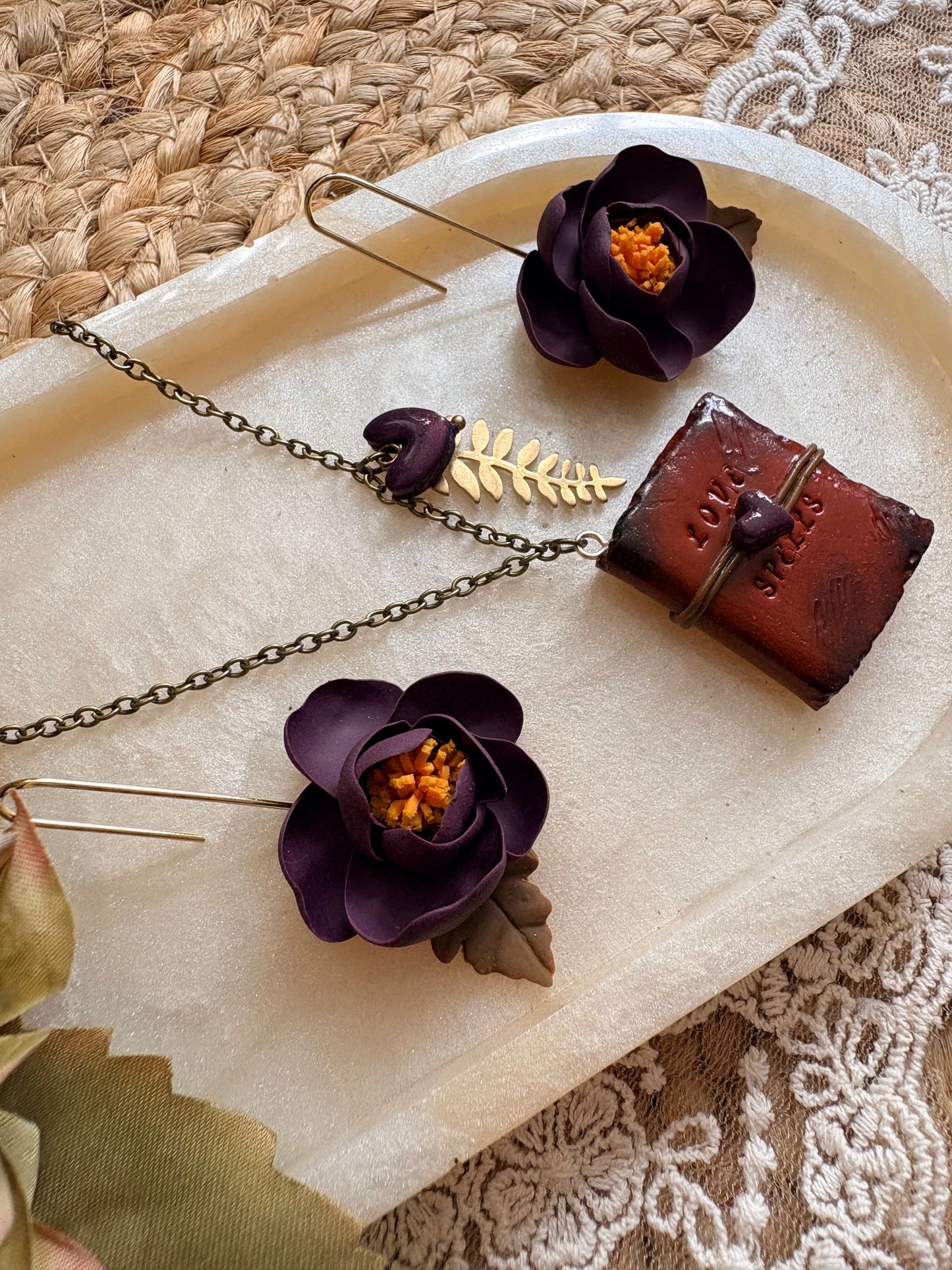 Miniature “Love Spells” hand crafted book necklace