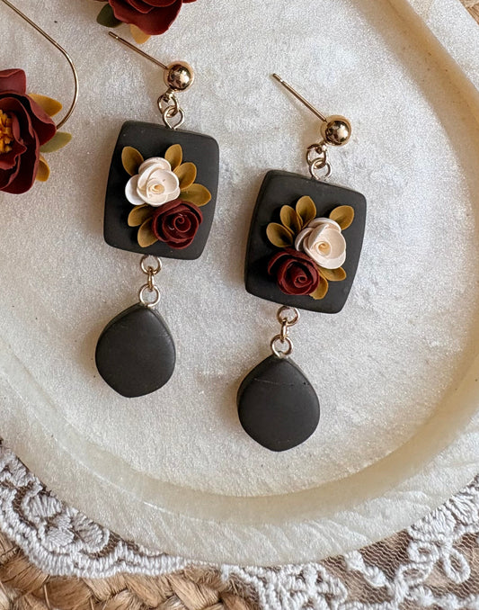Moody green floral dangles