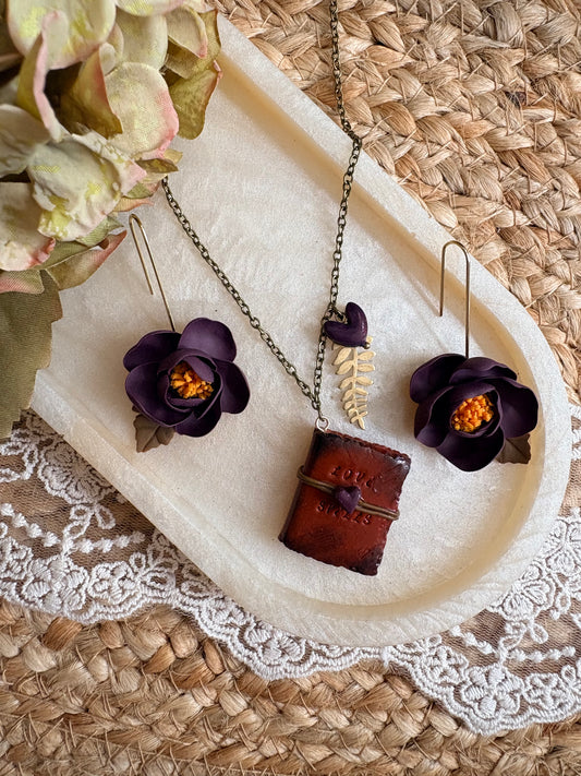 Miniature “Love Spells” hand crafted book necklace