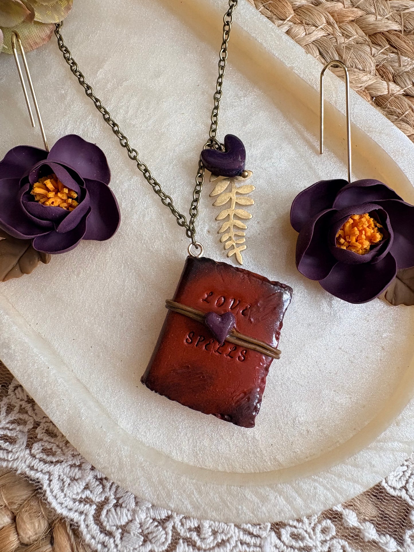 Miniature “Love Spells” hand crafted book necklace